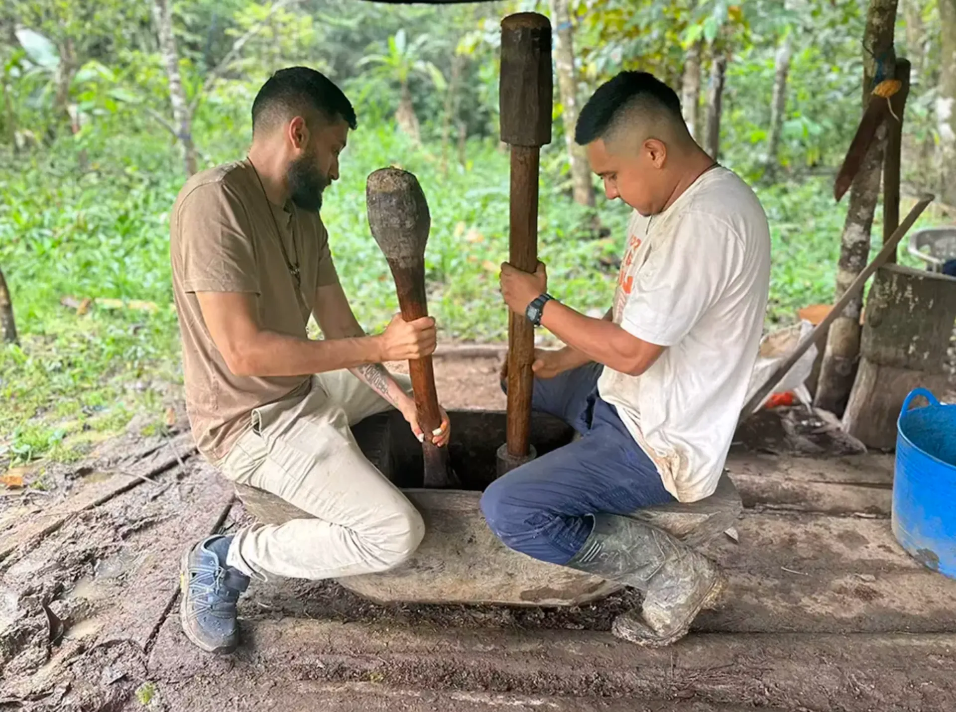 Preparing the ceremonial medicine by hand at MahaDevi in the Colombian Amazon